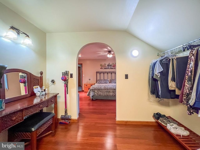 500 Newport Cir, Langhorne, PA 19053 - hall featuring arched walkways, wood finished floors, vaulted ceiling, and baseboards