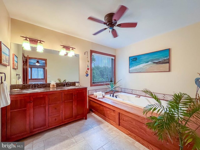 500 Newport Cir, Langhorne, PA 19053 - bathroom featuring a ceiling fan, double vanity, a garden tub, and healthy amount of natural light