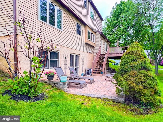 500 Newport Cir, Langhorne, PA 19053 - rear view of property with stairway, a patio area, a wooden deck, a yard, and stucco siding