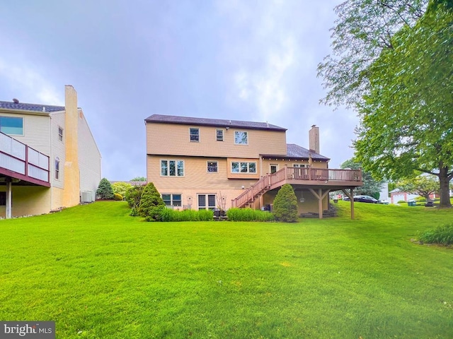 500 Newport Cir, Langhorne, PA 19053 - rear view of house featuring stairs, a wooden deck, a yard, and a chimney