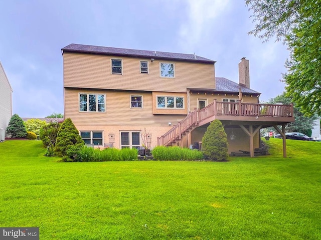 500 Newport Cir, Langhorne, PA 19053 - rear view of house with a chimney, a deck, a yard, and stairs