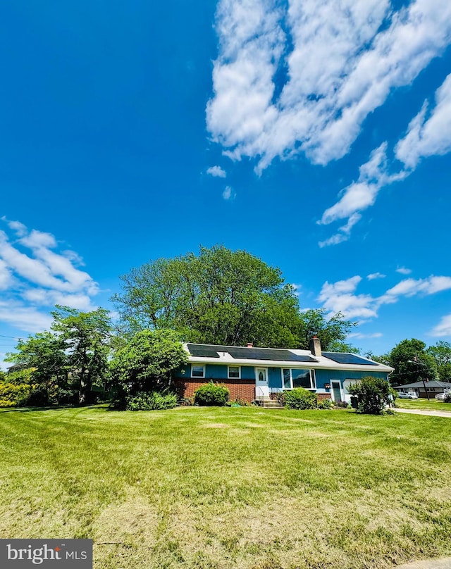 1 Lamont Rd, Burlington, NJ 08016 - view of front of property with a chimney and a front yard