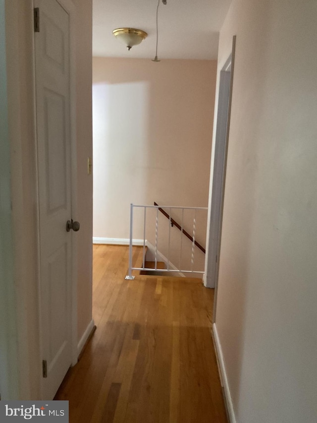 2817 Ontario Ave, Baltimore, MD 21234 - hall with an upstairs landing and wood finished floors