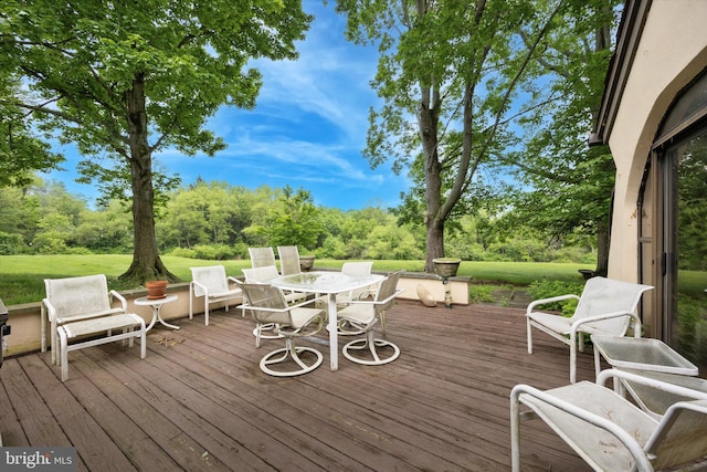 8 Fetlock Ln, Blue Bell, PA 19422 - wooden deck with view of wooded area, outdoor dining area, and a lawn