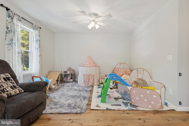 301 Heine Ave, Woodbine, NJ 08270 - recreation room with hardwood / wood-style floors, a ceiling fan, and baseboards