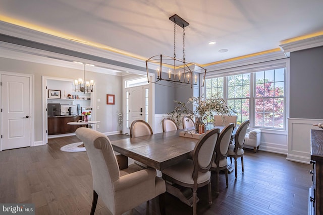 232 Cobblestone Ln, Bethlehem, PA 18020 - dining area with a chandelier, dark wood finished floors, ornamental molding, and a wainscoted wall