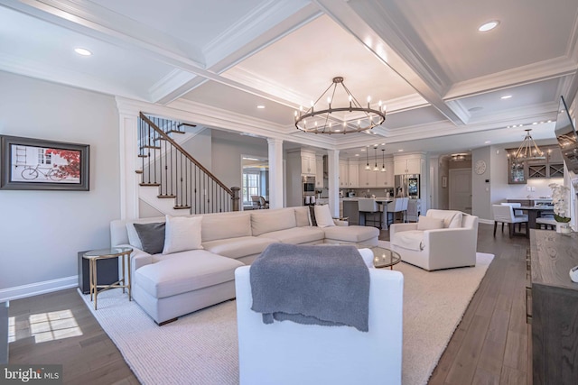 232 Cobblestone Ln, Bethlehem, PA 18020 - living room featuring a chandelier, crown molding, decorative columns, beam ceiling, and dark wood-style flooring