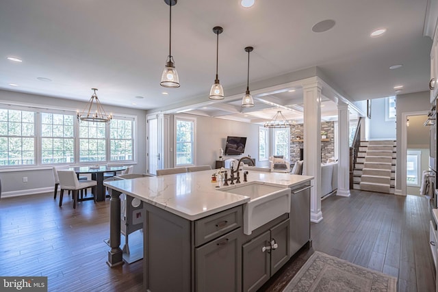 232 Cobblestone Ln, Bethlehem, PA 18020 - kitchen featuring baseboards, a sink, stainless steel dishwasher, open floor plan, and dark wood-style floors
