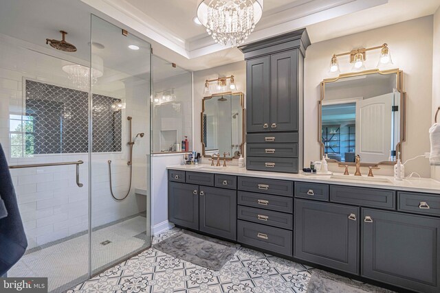 232 Cobblestone Ln, Bethlehem, PA 18020 - bathroom featuring a shower stall, tile patterned floors, double vanity, and a chandelier