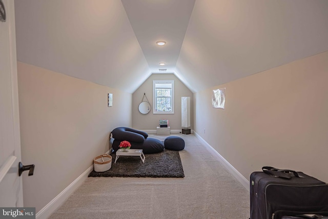 232 Cobblestone Ln, Bethlehem, PA 18020 - living area with vaulted ceiling, carpet floors, and baseboards