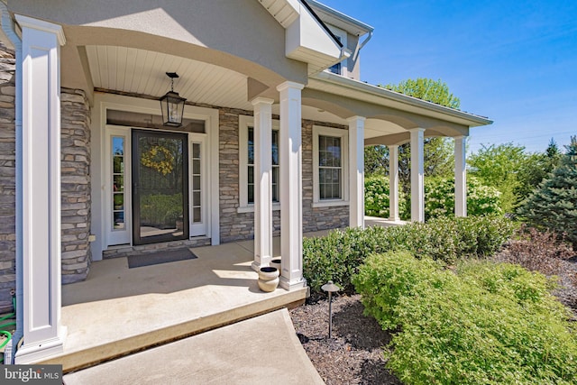 232 Cobblestone Ln, Bethlehem, PA 18020 - entrance to property featuring stone siding and a porch