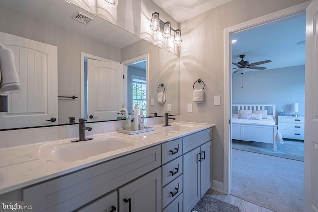 232 Cobblestone Ln, Bethlehem, PA 18020 - ensuite bathroom featuring a ceiling fan, double vanity, and baseboards