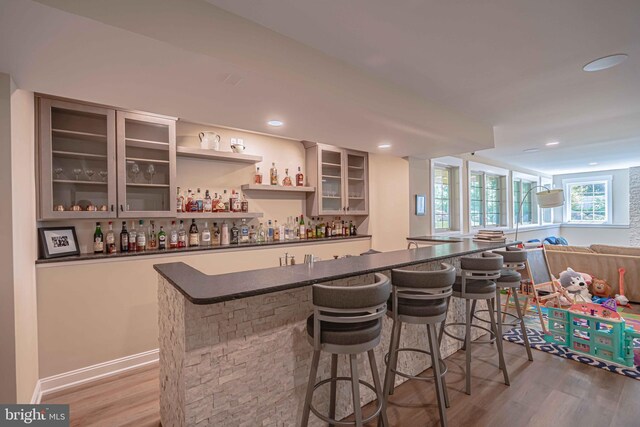 232 Cobblestone Ln, Bethlehem, PA 18020 - indoor bar featuring light wood-style flooring and recessed lighting