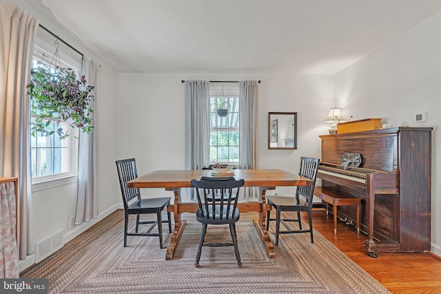 1381 Burmont Rd, Drexel Hill, PA 19026 - dining room with plenty of natural light, wood finished floors, and baseboards