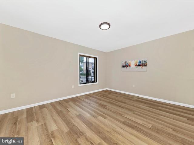 6994 Hanover Pkwy Unit 101, Greenbelt, MD 20770 - spare room featuring light wood-style floors and baseboards