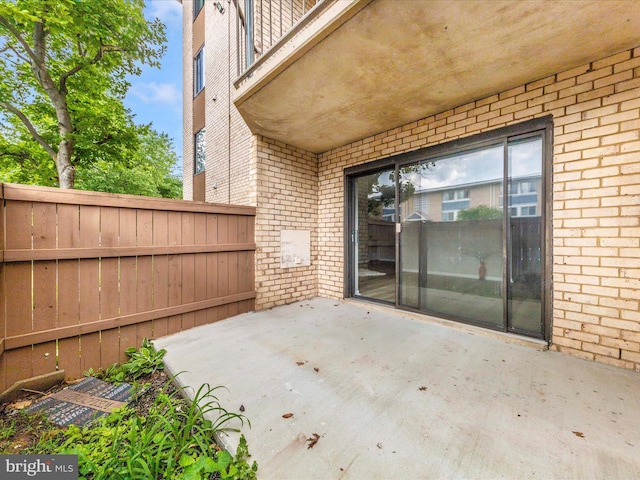 6994 Hanover Pkwy Unit 101, Greenbelt, MD 20770 - view of patio / terrace with fence