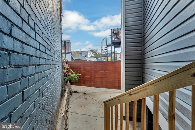 view of patio / terrace featuring fence