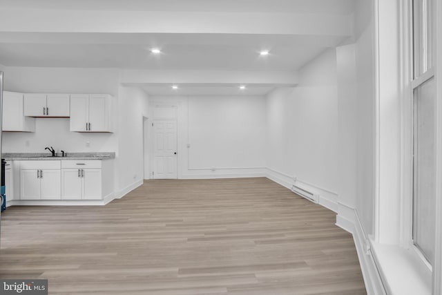19 Valley St, Lewistown, PA 17044 - kitchen with white cabinets, a sink, light wood-style flooring, baseboards, and recessed lighting