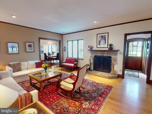 439 W Park Ave, State College, PA 16803 - living room featuring ornamental molding, wood finished floors, a fireplace, and recessed lighting