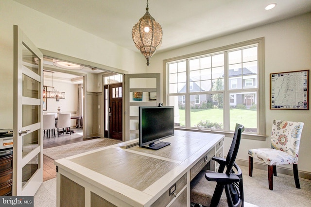 office area with a chandelier, baseboards, light carpet, and recessed lighting