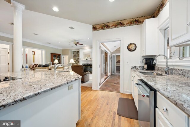 8320 Ingleton Cir W, Easton, MD 21601 - kitchen with a sink, dishwasher, ceiling fan, white cabinets, and light wood finished floors