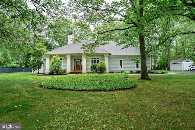8320 Ingleton Cir W, Easton, MD 21601 - view of front of house featuring a chimney and a front yard