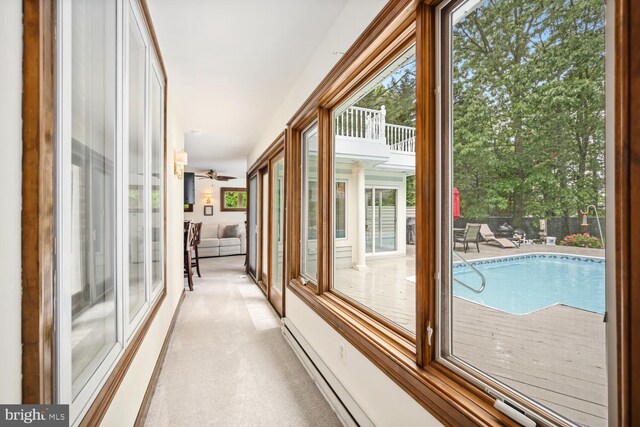8320 Ingleton Cir W, Easton, MD 21601 - hall featuring light colored carpet and a baseboard heating unit
