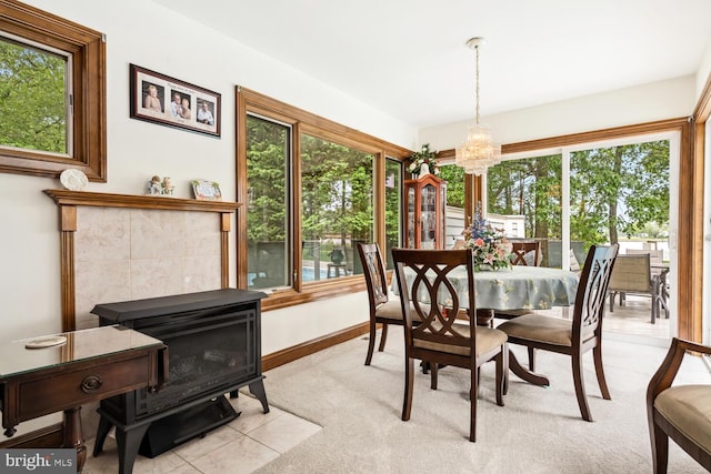 8320 Ingleton Cir W, Easton, MD 21601 - dining area with healthy amount of natural light, a chandelier, light carpet, and baseboards