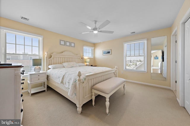 127 E 13th St, Long Beach Township, NJ 08008 - bedroom featuring light carpet, baseboards, and a ceiling fan