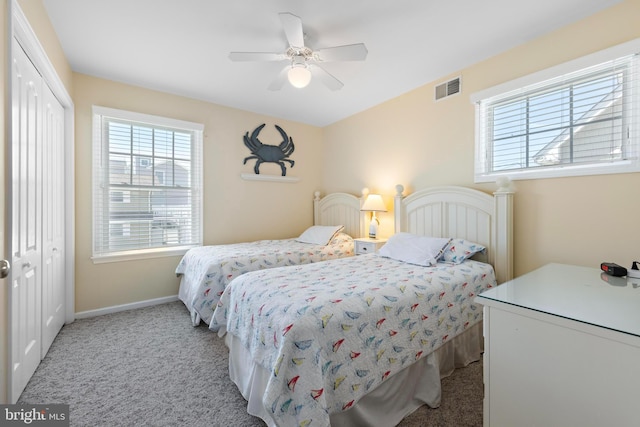 127 E 13th St, Long Beach Township, NJ 08008 - bedroom featuring light carpet, a closet, baseboards, and ceiling fan