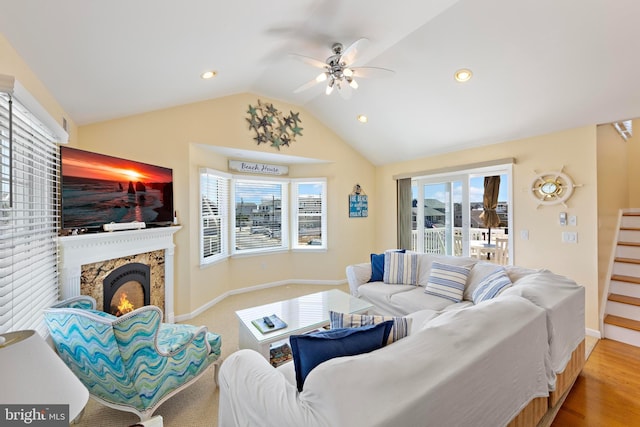 127 E 13th St, Long Beach Township, NJ 08008 - living area with ceiling fan, vaulted ceiling, stairway, plenty of natural light, and baseboards