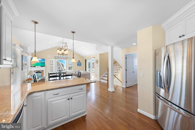 127 E 13th St, Long Beach Township, NJ 08008 - kitchen with stainless steel refrigerator with ice dispenser, a peninsula, dark wood-style floors, white cabinetry, and open floor plan