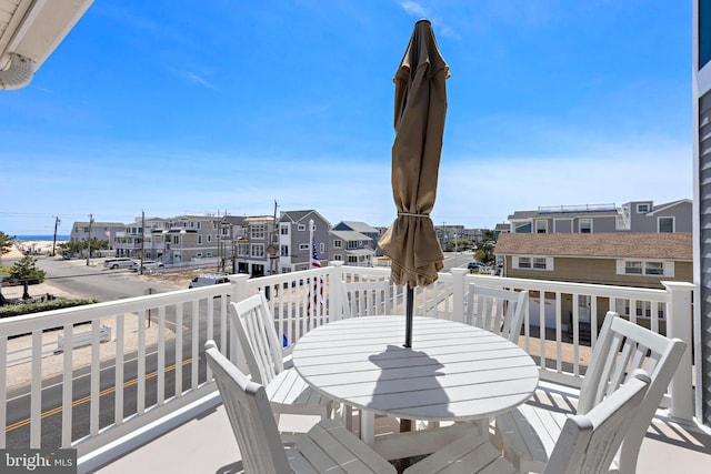 127 E 13th St, Long Beach Township, NJ 08008 - balcony featuring a residential view and outdoor dining space