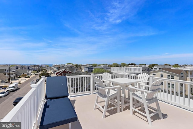 127 E 13th St, Long Beach Township, NJ 08008 - view of patio featuring a residential view, a balcony, and outdoor dining space