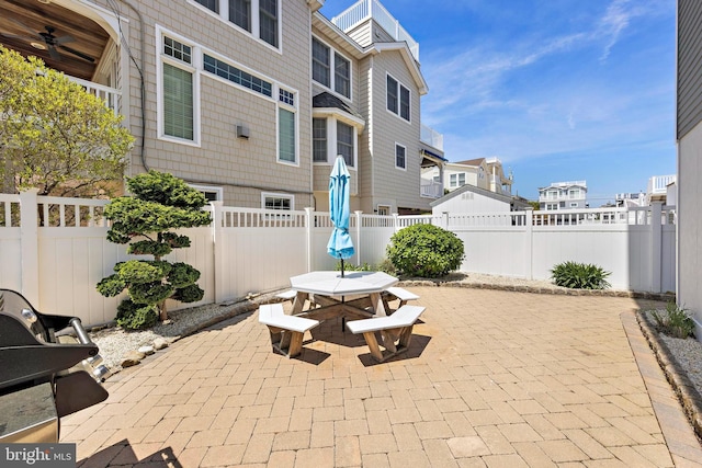 127 E 13th St, Long Beach Township, NJ 08008 - fenced backyard with outdoor dining space, a patio, and a residential view