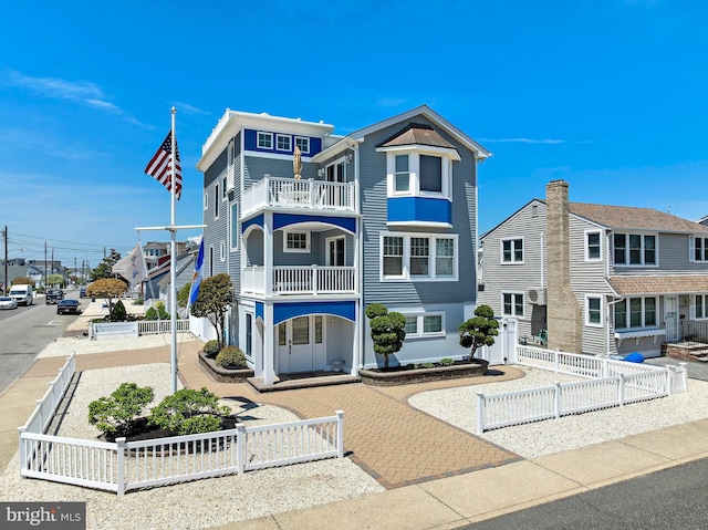 127 E 13th St, Long Beach Township, NJ 08008 - rear view of house with a balcony