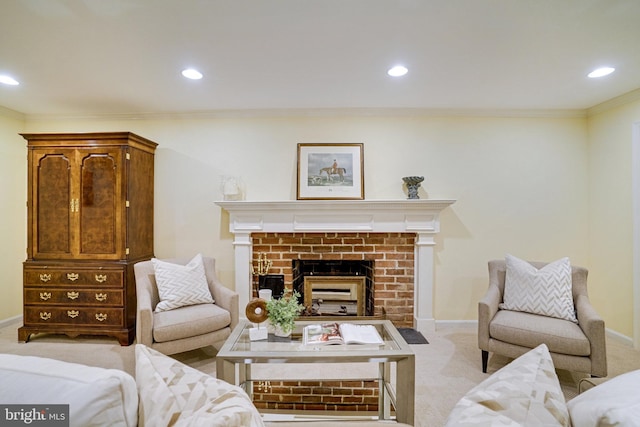 living area featuring light carpet, crown molding, recessed lighting, baseboards, and a fireplace