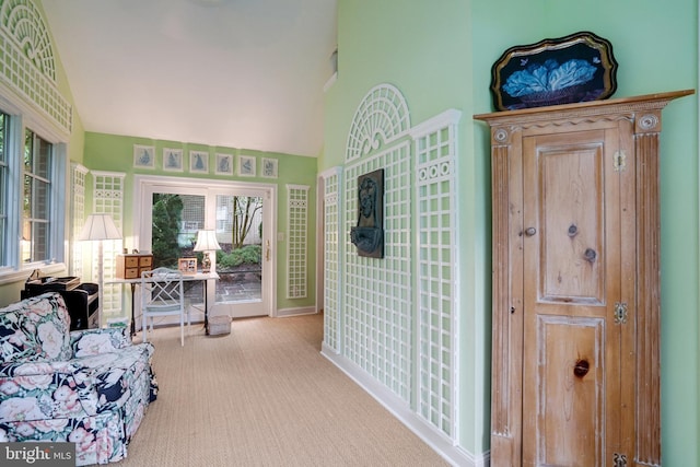bedroom featuring baseboards, carpet flooring, multiple windows, access to outside, and high vaulted ceiling