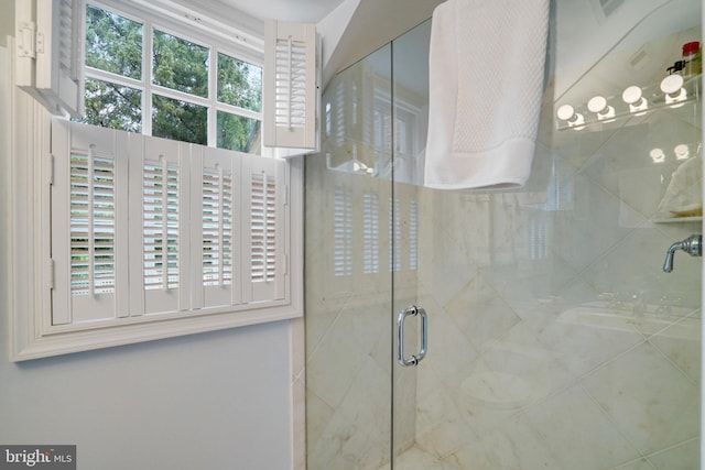 bathroom featuring a stall shower