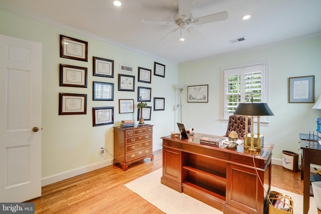 office area with ornamental molding, light wood-type flooring, a ceiling fan, baseboards, and recessed lighting