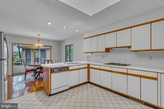 109 Kingfisher Cir, Weems, VA 22576 - kitchen with a sink, dishwasher, light floors, light countertops, and recessed lighting