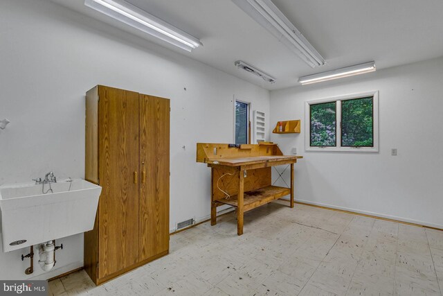 109 Kingfisher Cir, Weems, VA 22576 - miscellaneous room featuring tile patterned floors and a sink