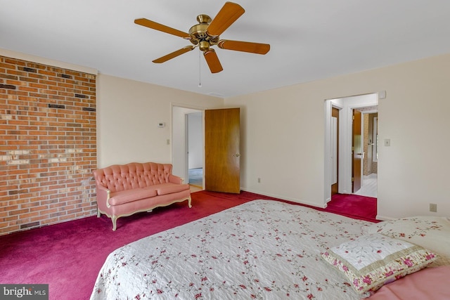 109 Kingfisher Cir, Weems, VA 22576 - bedroom featuring carpet flooring, brick wall, and ceiling fan