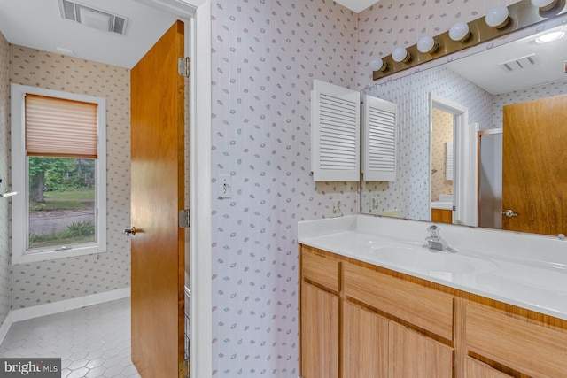 109 Kingfisher Cir, Weems, VA 22576 - full bathroom featuring wallpapered walls, tile patterned floors, baseboards, vanity, and an enclosed shower