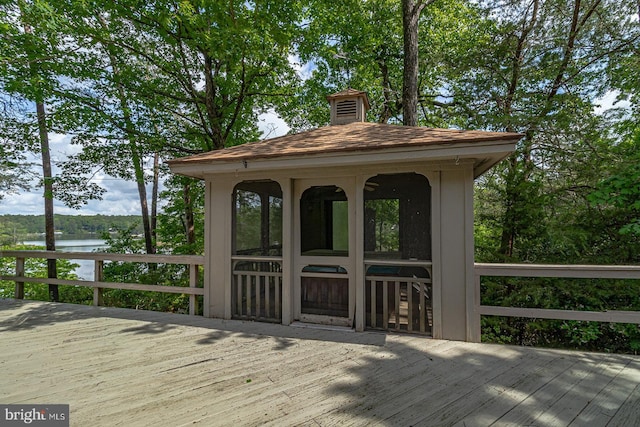 109 Kingfisher Cir, Weems, VA 22576 - wooden deck with a water view and a sunroom