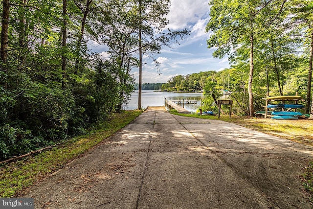 109 Kingfisher Cir, Weems, VA 22576 - view of street with a boat ramp and a water view