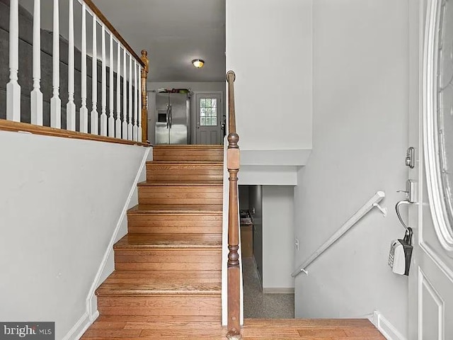 stairway with baseboards