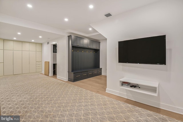 4701 Fort Sumner Dr, Bethesda, MD 20816 - unfurnished living room featuring light wood-type flooring, recessed lighting, and baseboards