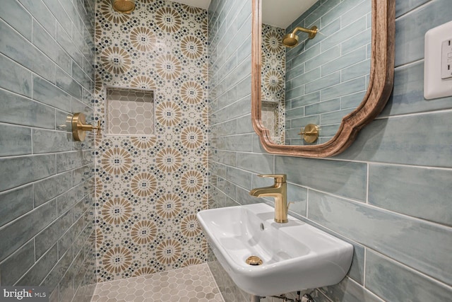 4701 Fort Sumner Dr, Bethesda, MD 20816 - full bathroom featuring a sink, tile walls, and tiled shower
