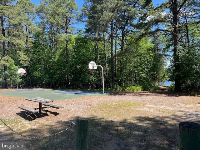 view of sport court featuring community basketball court